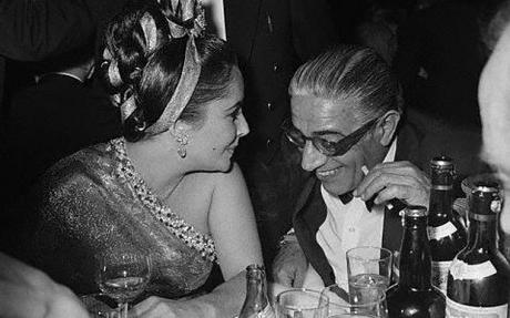 Liz parties with Onassis