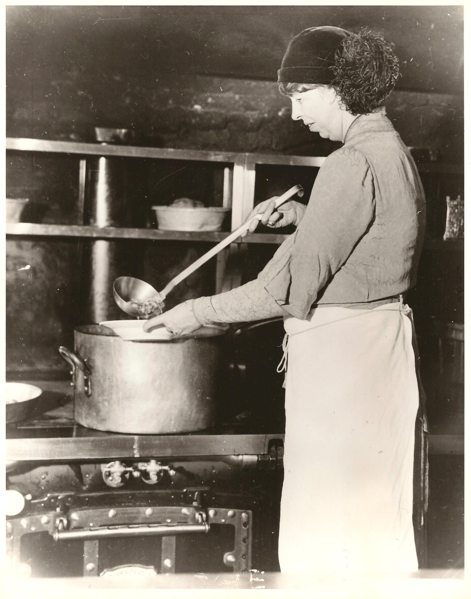 Eleanor Roosevelt spooning out nourishment in a Great Depression soup kitchen.