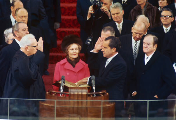 26. Holding the Bible as her husband took the oath of office, January 20, 1969.