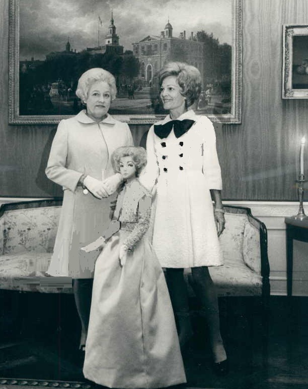 35. trary to popular perception, Pat Nixon also wore clothing that reflected popular trends - like the mini-skirt here, in 1969, during a presentation of a statue with her Inaugural dress.