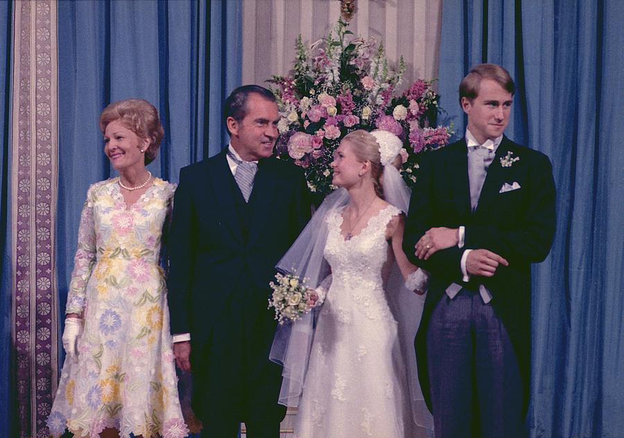 57. Pat Nixon and the President a their daughter Tricia June 1971 White House wedding to Edward Cox.