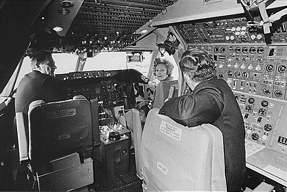 67. Pat Nixon inspects the first 747 jet.
