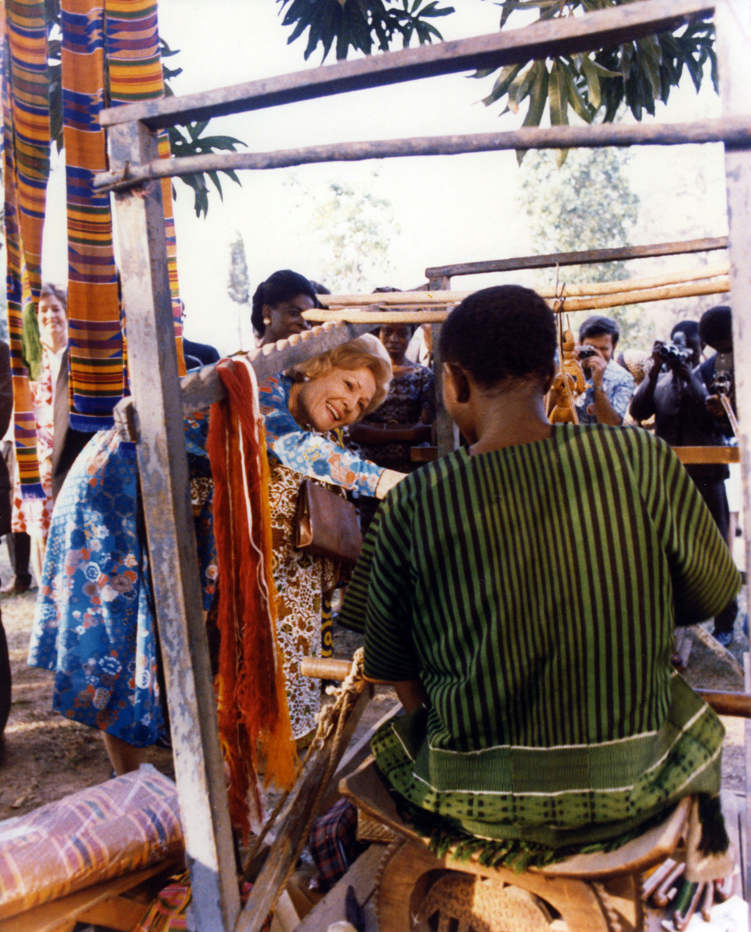 70. Mrs. Nixon speaking with craftsmen in Africa.