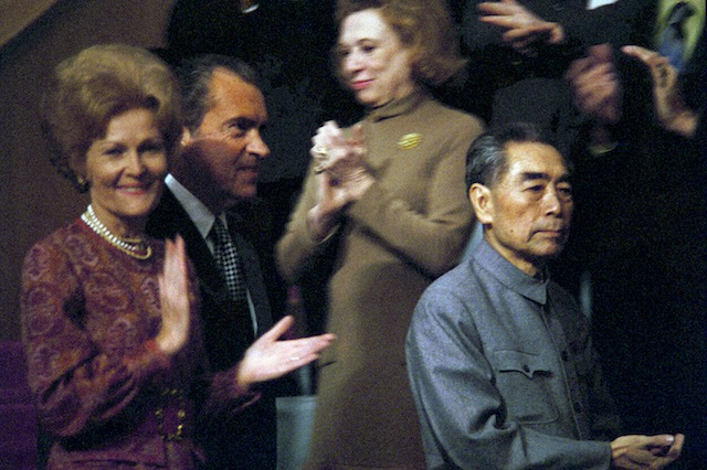78. With Chinese Premier Chou En-lai and President Nixon at a Bejing sporting event.