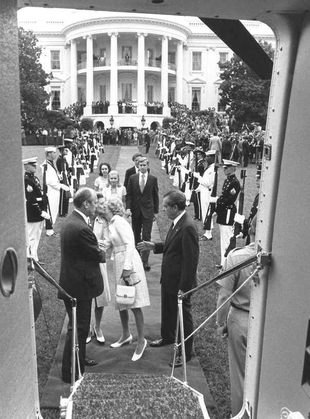 89. Pat Nixon kisses her friend and successor Betty Ford before boarding the helicopter which took her and President Nixon from the White House - she never returned.