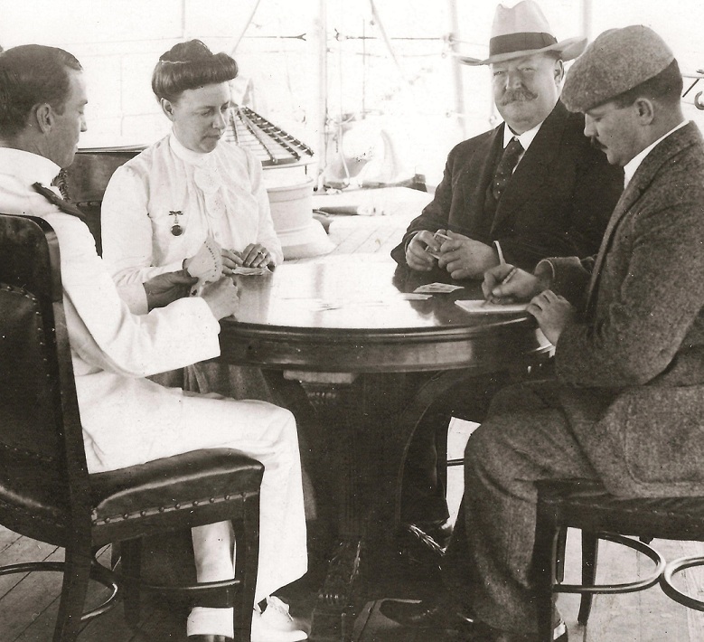 Nellie Taft liked to surf, smoke, drink and gamble, playing cards here on a ship to Asia.