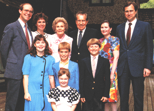 94. Pat and Richard Nixon on their 50th wedding anniversary with their children, sons-in-law and grandchildren, 1991.