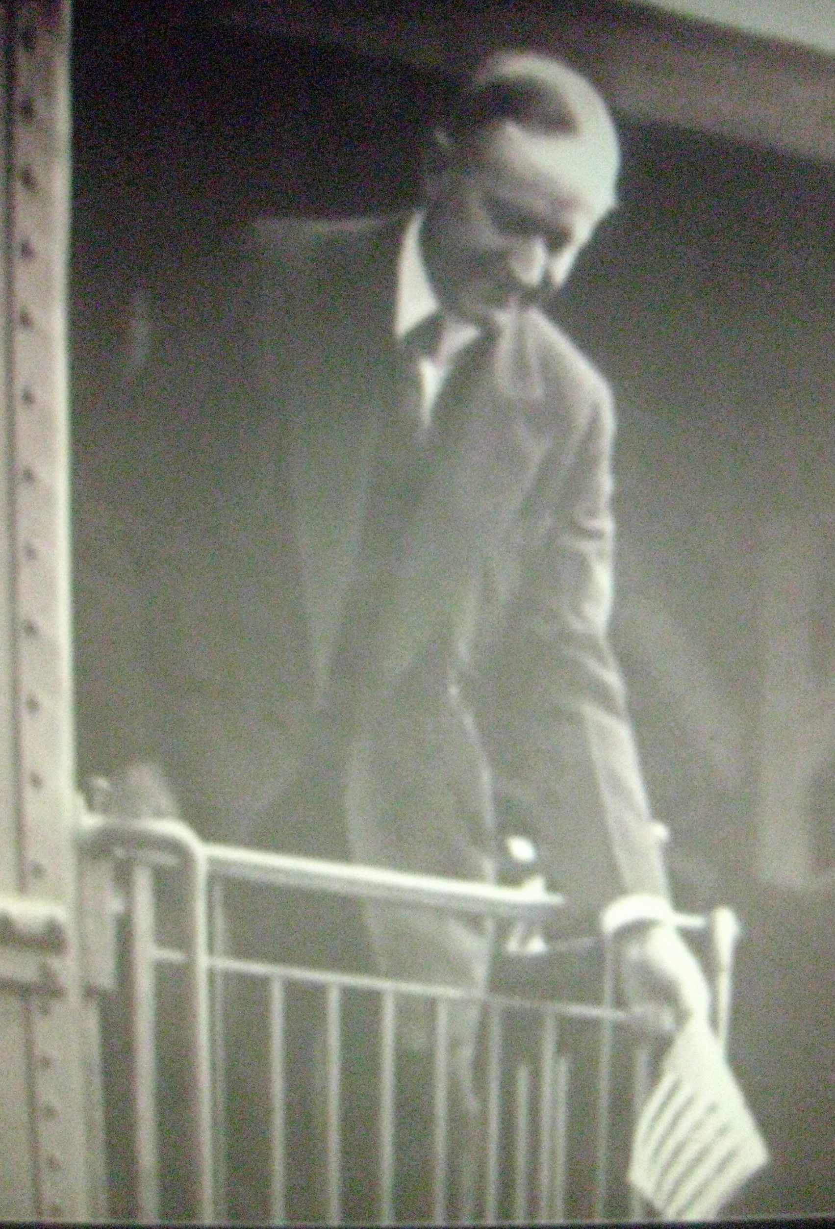 Coolidge greeted a voter from the back of his train on his return trip to Washington from his son's burial.