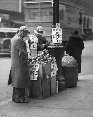 Men selling apples on street corners during the Great Depression.