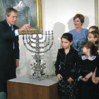 George W. Bush lights a mennorah in 2001, the first President to host Hanukkah parties in the White House.