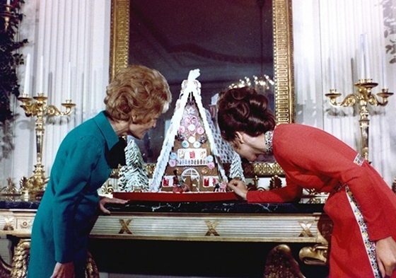 Mrs. Nixon and her daughter Julie check out the 1971 Gingerbread house, modest by modern standards.