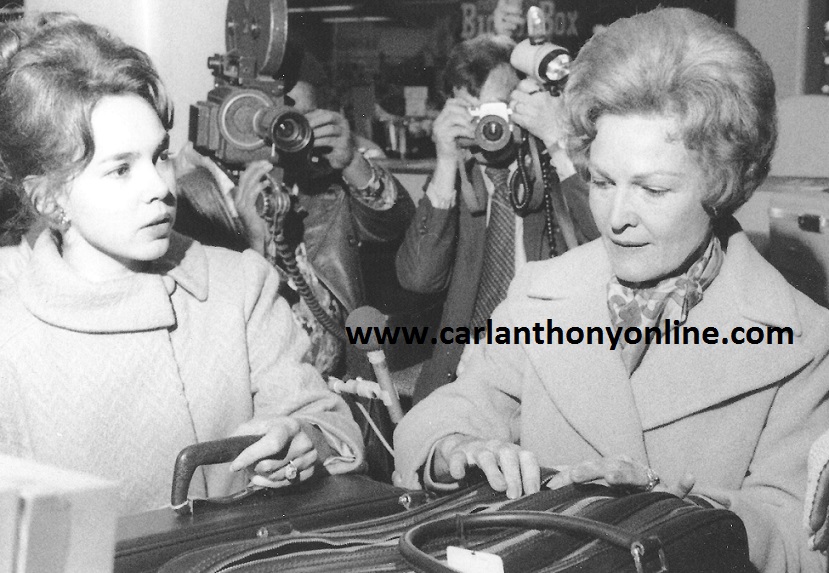 Pat Nixon and her daughter Julie out holiday shopping - the press in tow.