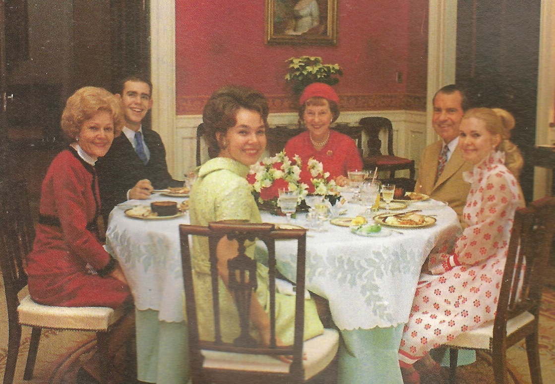 President and Mrs. Nixon, daughters Julie and Tricia, son-in-law David and his grandmother former First Lady Mamie Eisenhower share Christmas Dinner 1970.