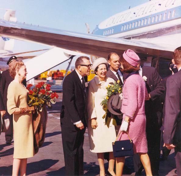 Smilingly welcoming Mrs. Kennedy to Dallas at Love Field.