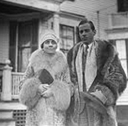 John Coolidge in his college raccoon coat with his mother, (Boston Public Library)