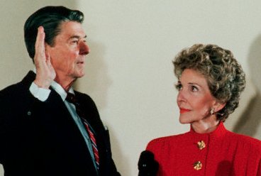 Mrs. Reagan held the Bible on which her husband took his Sunday oath in the private White House ceremony....