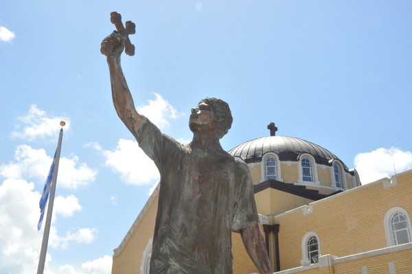 Outside the local Greek Orthodox cathedral, a statue marks the annual Epiphany dive. (Rachel Jolley)