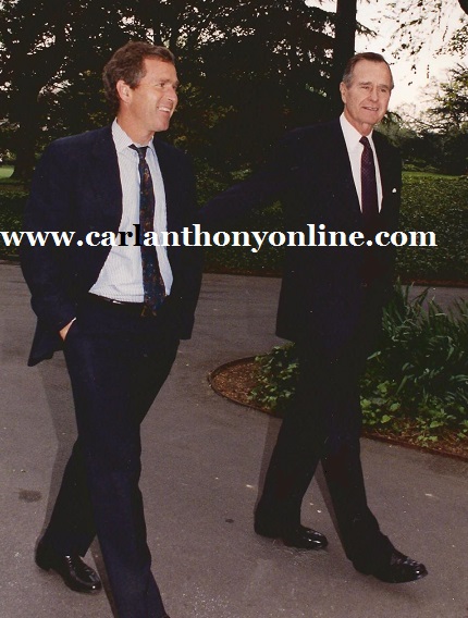 President George Bush and his son, future President George W. Bush strolling the White House South Lawn.