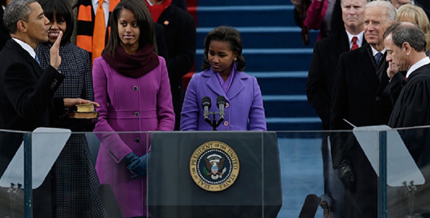 The First Daughters look on as their father President Obama repeats his public oath of office, Monday, January 21, 2013   (AP-Pablo Martinez Monsivais)