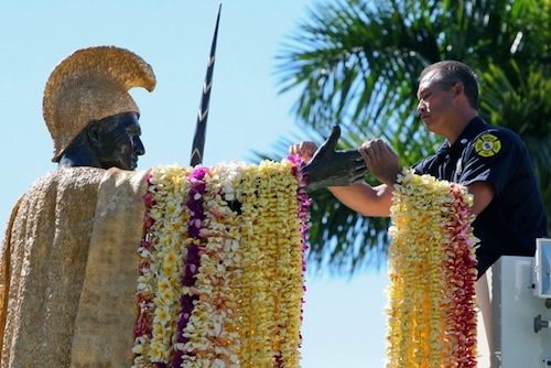 Draping leis on the Great One.