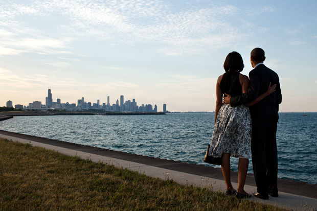 The Obamas overlook the Chicago skyline.