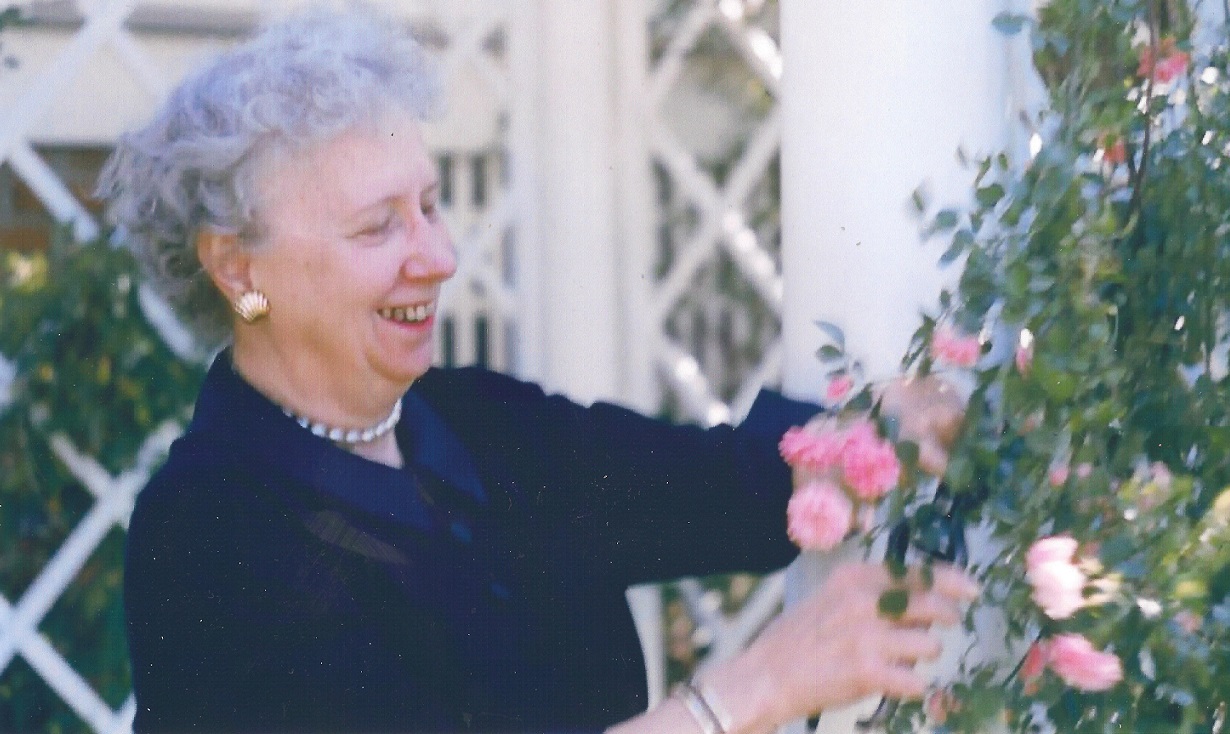 Bess Truman tends to her roses at home.