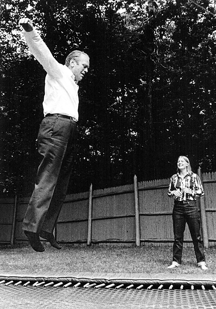 Ford and daughter Susan in their suburban Virginia home enjoying the trampoline.