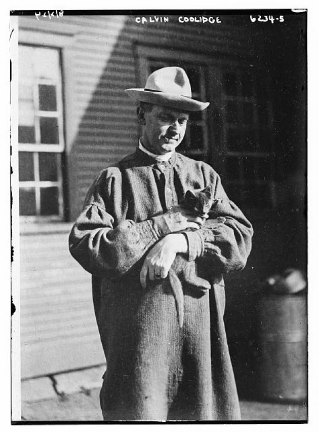 President Coolidge with one of his many cats.