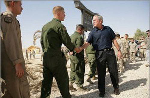 President George W. Bush greets U.S. Military personnel at Al Asad Airbase, Al Anbar Province, Iraq, Monday, September 3, 2007. (GWBL)