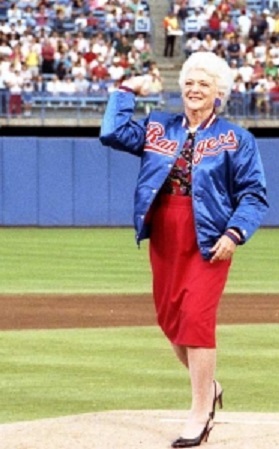 Barbara Bush throws out a ceremonial first pitch for the May 1989 season opener of the Texas Rangers.