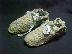 A pair of slippers made by Mrs. McKinley which she donated for fundraising organizations she supported.