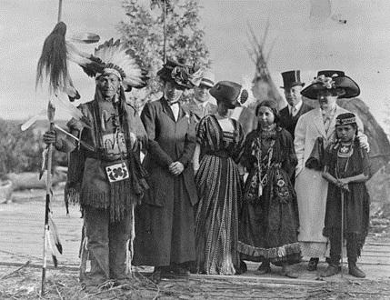 With Native Americans during a celebration in Canada.