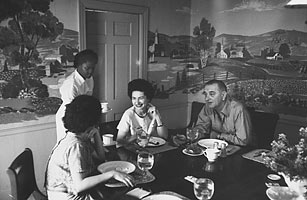 LBJ and Lady Bird with their cook Zephyr Wright in the LBJ Ranch dining room.