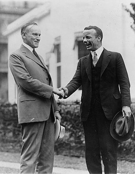 "Welcome home!" President Coolidge greets Teddy Roosevelt, Jr. at the White House in September of 1924.