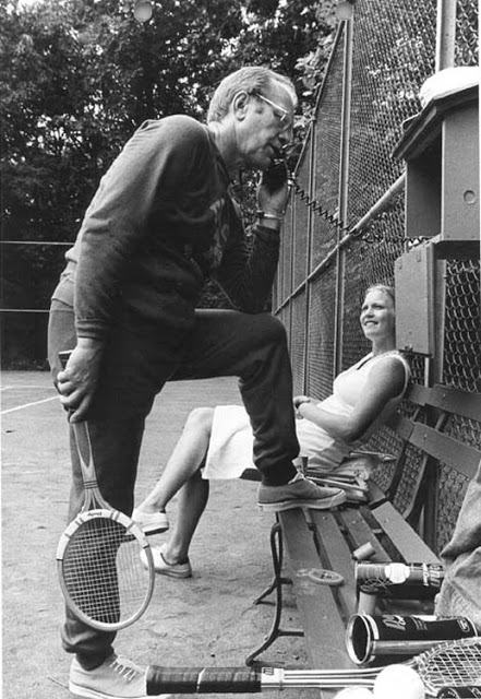 President Ford with Chris Evert on the tennis court.